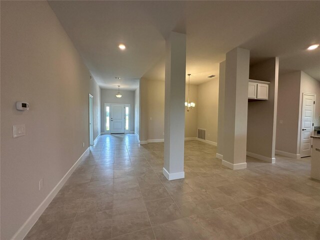 4445 SW 90th Pl, Ocala, FL 34476 - corridor with recessed lighting, a chandelier, baseboards, and light tile patterned floors