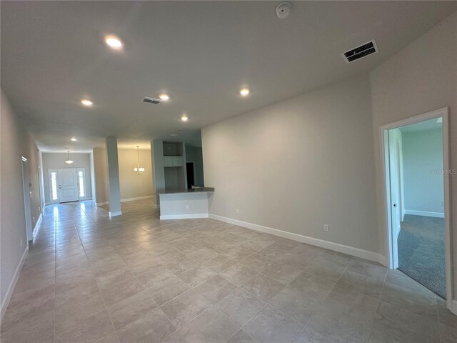 4445 SW 90th Pl, Ocala, FL 34476 - unfurnished living room featuring recessed lighting and baseboards