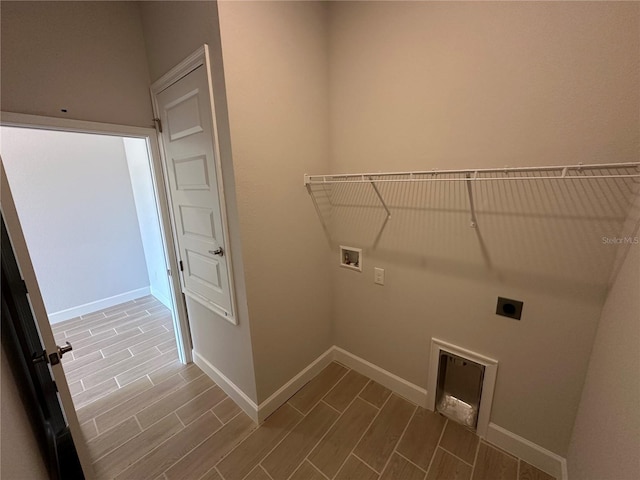 clothes washing area featuring hookup for an electric dryer and washer hookup