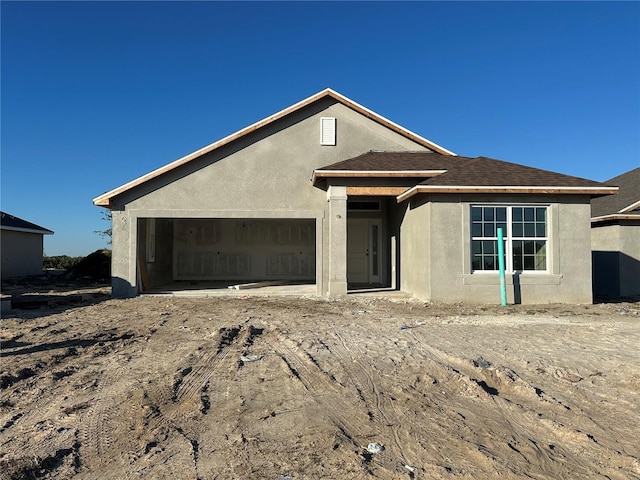 ranch-style home with a garage