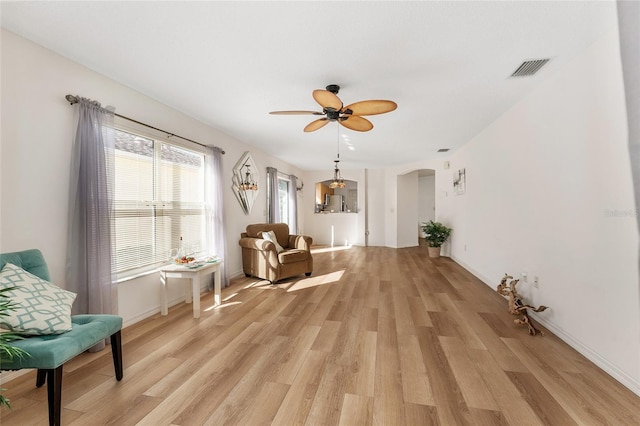 sitting room featuring ceiling fan and light hardwood / wood-style flooring