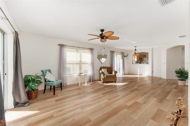 unfurnished room with ceiling fan and light hardwood / wood-style flooring