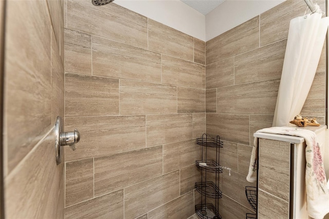 bathroom featuring a shower with curtain