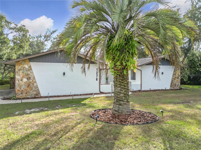 exterior space featuring a lawn