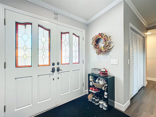 entrance foyer featuring wood-type flooring and ornamental molding