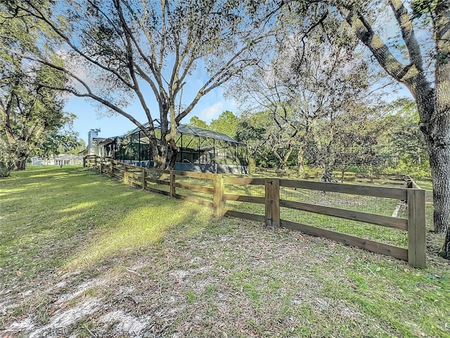 view of yard featuring a lanai