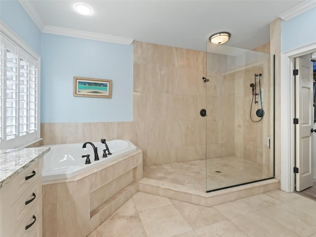 bathroom featuring plus walk in shower, ornamental molding, vanity, and a healthy amount of sunlight