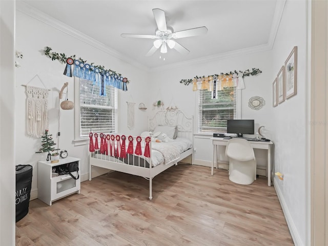 bedroom with ceiling fan, crown molding, and light hardwood / wood-style flooring