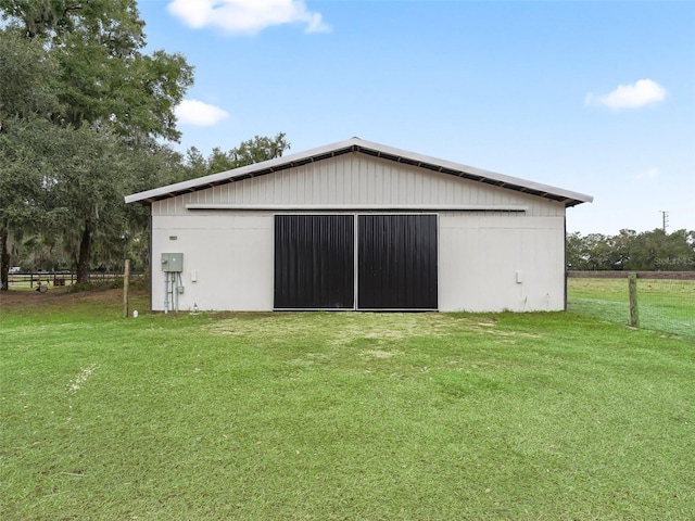 garage featuring a yard