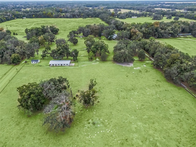 birds eye view of property featuring a rural view