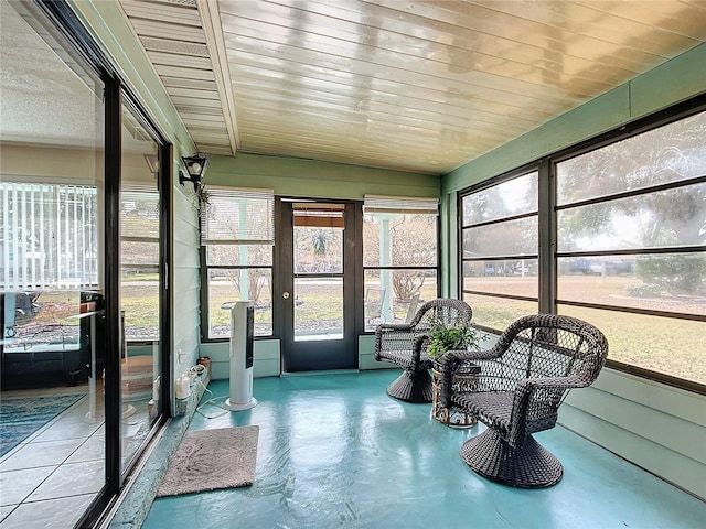 sunroom / solarium featuring plenty of natural light