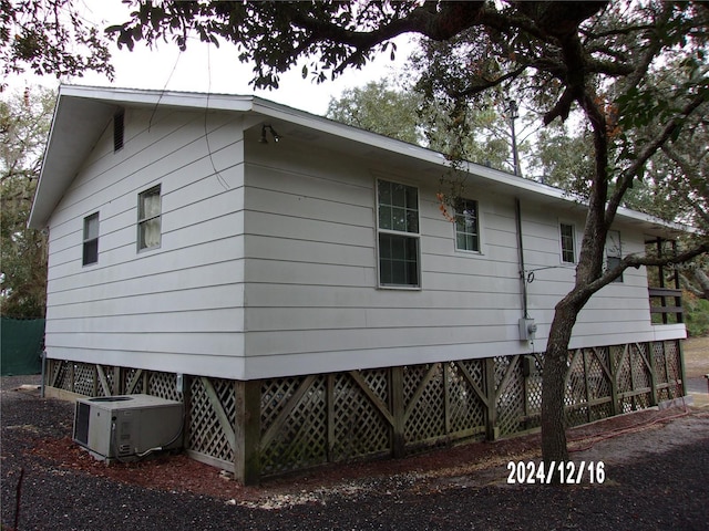 view of home's exterior featuring cooling unit