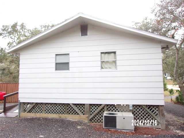 view of home's exterior featuring central AC unit