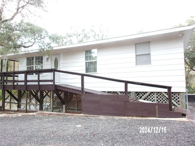 view of front of house with a deck