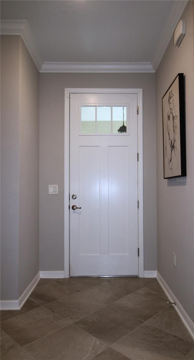 entryway featuring ornamental molding