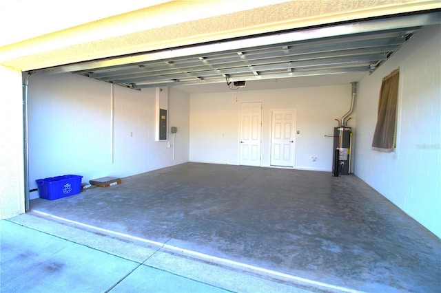 9871 SW 99th Loop, Ocala, FL 34481 - garage with water heater, a garage door opener, and electric panel
