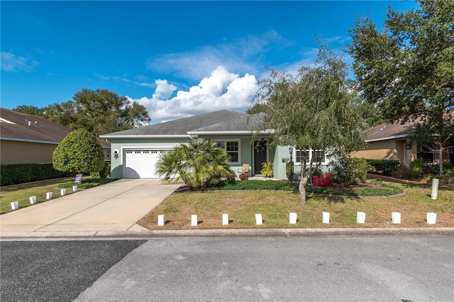 ranch-style home with a front lawn and a garage