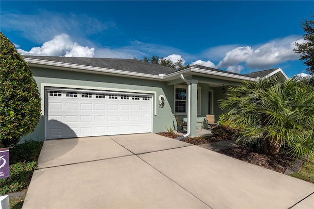 ranch-style home with a garage