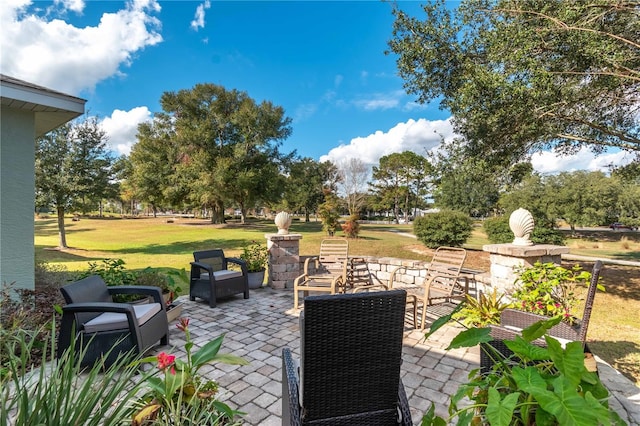 view of patio / terrace with a fire pit