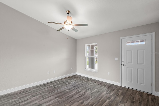 entryway with dark hardwood / wood-style floors and ceiling fan