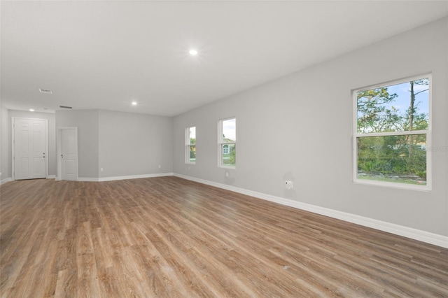 unfurnished room featuring light wood-type flooring