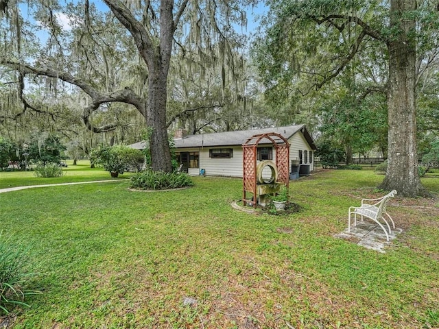 view of yard with central AC