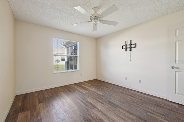 unfurnished room with ceiling fan, dark hardwood / wood-style floors, and a textured ceiling