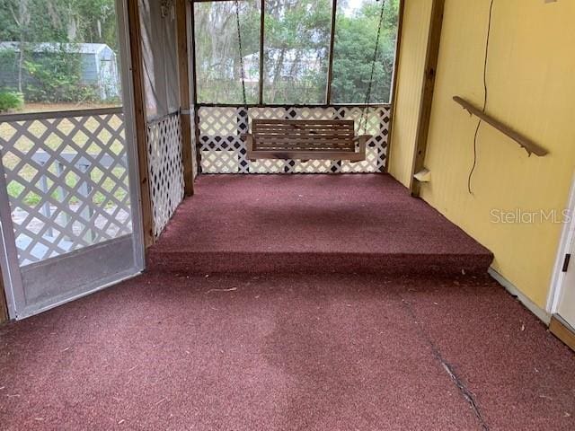 view of unfurnished sunroom