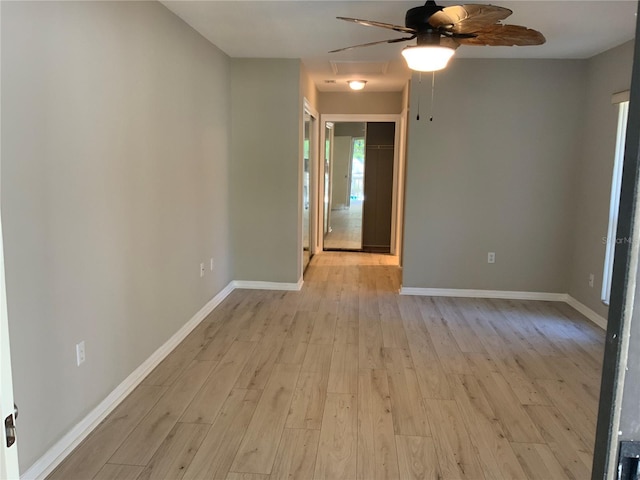 unfurnished room featuring ceiling fan and light hardwood / wood-style floors