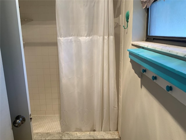 bathroom with a shower with curtain