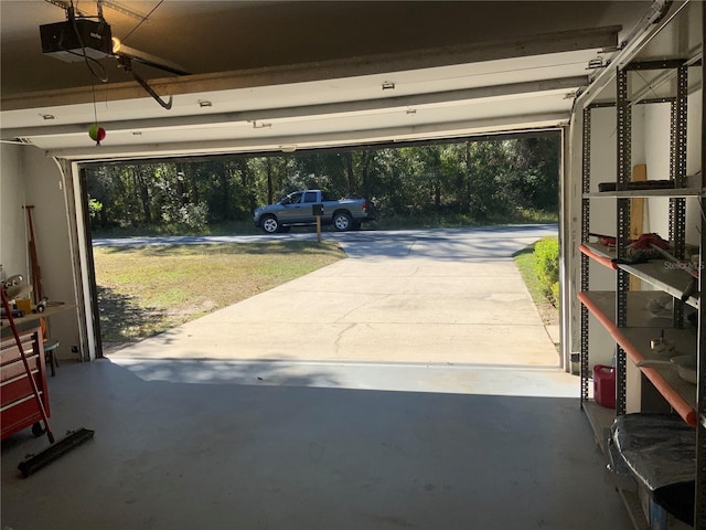 garage featuring a garage door opener