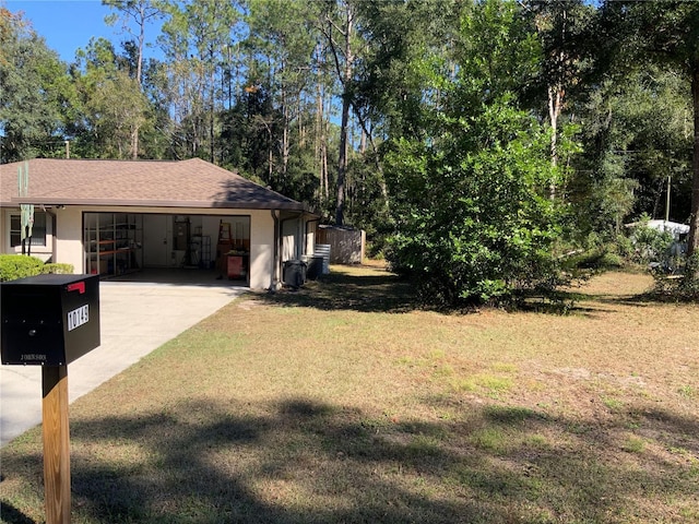 view of side of home featuring a yard