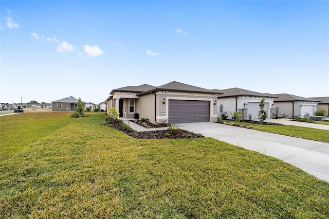 view of front of home featuring a garage and a front lawn