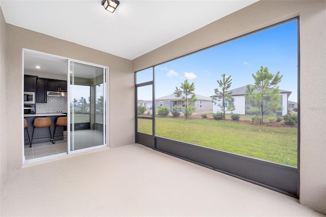 view of unfurnished sunroom