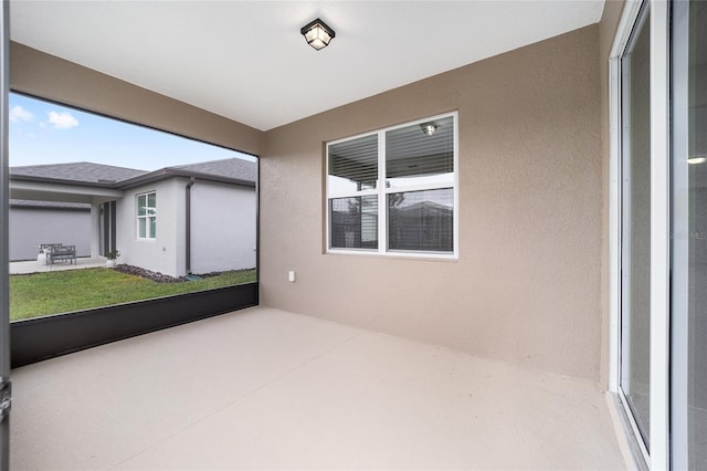 view of unfurnished sunroom