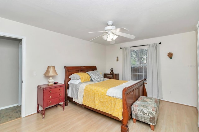 bedroom featuring ceiling fan and light wood-type flooring