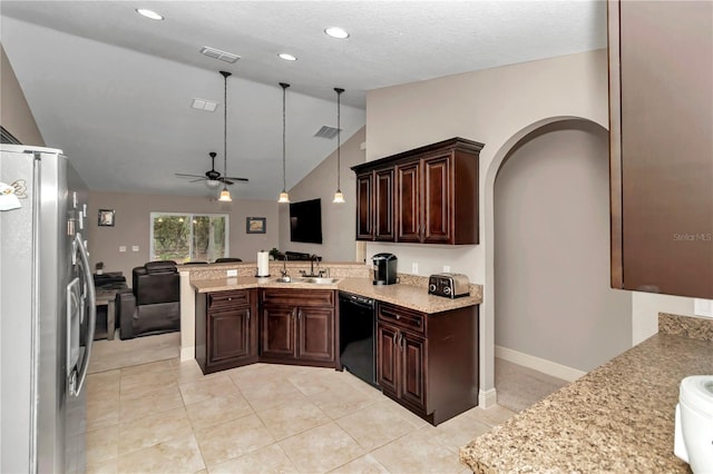 kitchen with dishwasher, lofted ceiling, sink, stainless steel fridge, and decorative light fixtures