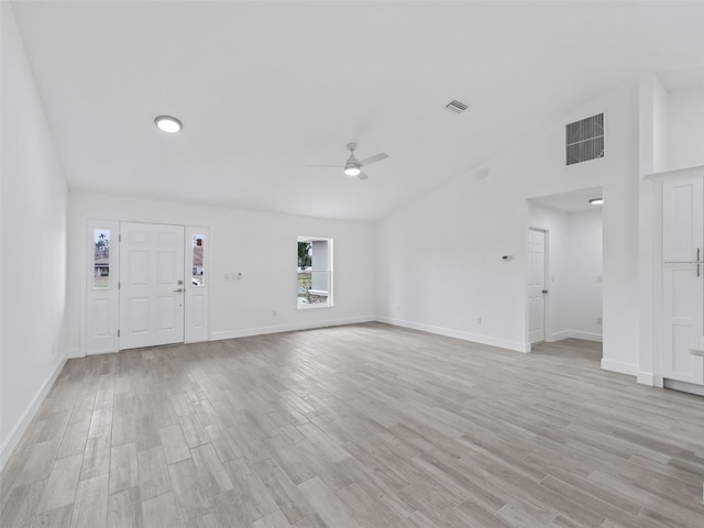 unfurnished living room with ceiling fan, light wood-type flooring, and lofted ceiling