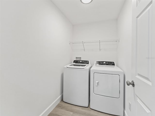 washroom featuring separate washer and dryer