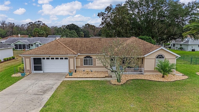 ranch-style house featuring a porch, a garage, and a front lawn