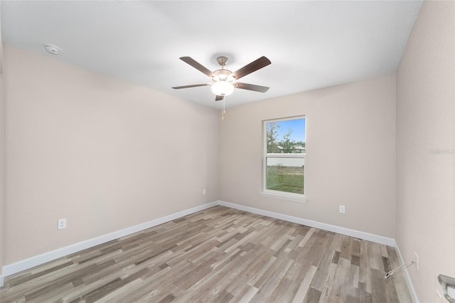 unfurnished room with ceiling fan and light hardwood / wood-style floors