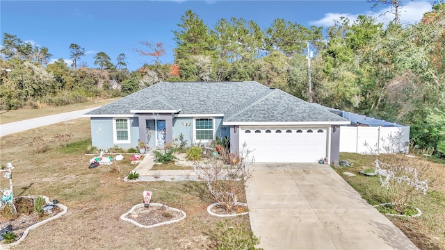 single story home with a garage