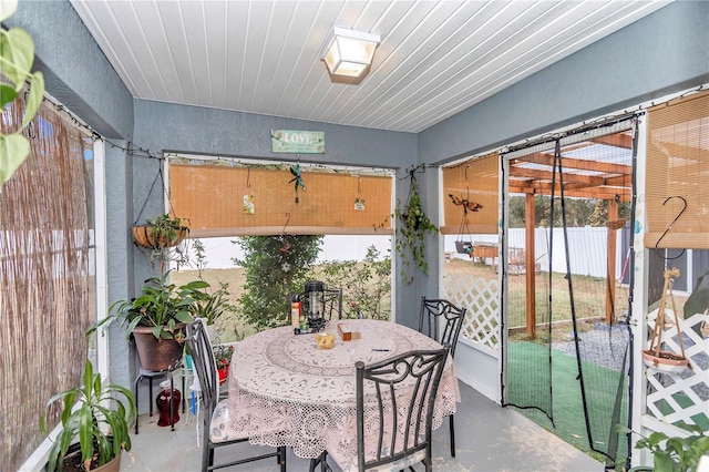 sunroom / solarium featuring a wealth of natural light