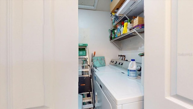 laundry room with washer and clothes dryer