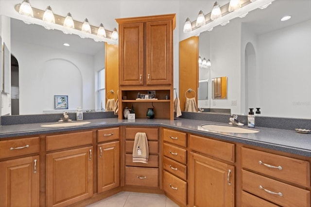 bathroom with vanity and tile patterned floors