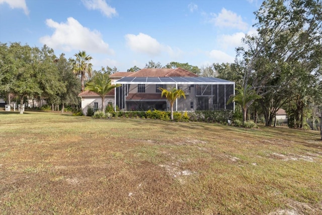 view of yard with a lanai