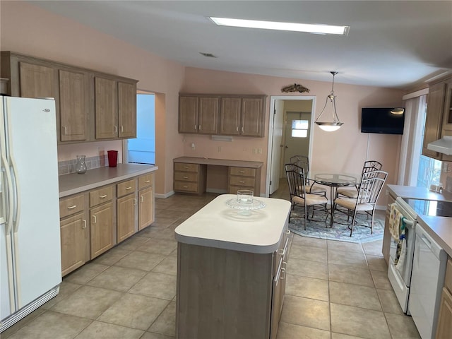 kitchen with hanging light fixtures, a kitchen island, white refrigerator with ice dispenser, light tile patterned floors, and range