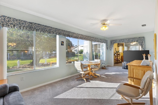 interior space featuring ceiling fan