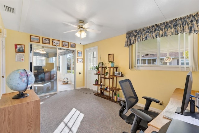 office area featuring carpet flooring and ceiling fan