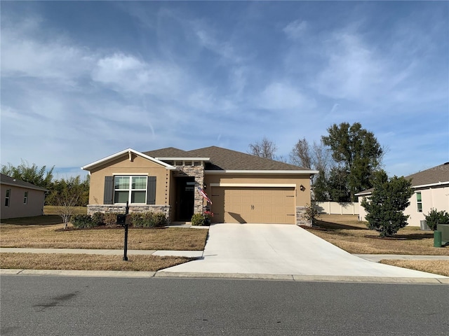 view of front of home with a garage